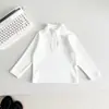Valle del Viento 2026 Invierno Nuevo Estilo Coreano Sencillo Camiseta Básica de Cuello Alto Medio para Niños Capa Interior Gruesa Versátil para Niños y Niñas