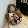 Bolsa de Crowdsourcing Avançada Sense para Multidões Pequenas Feminina Outono e Inverno 2024 Nova Moda Bolsa Transversal para Dor Bolsa Balde Portátil de Desenho Animado Fofo