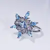 Traje de joyería clásica para boda anillo de copo de nieve pendientes de botón de circón azul para mujer traje de anillo de collar joyería transfronteriza europea y americana