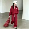 Nueva colección de otoño para niñas: sudadera casual de bloques de color con media cremallera y cuello alto y pantalones de chándal holgados de pierna ancha, estilo moderno