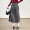 Saia plissada para mulheres, novo estilo outono e inverno 2026, cintura alta, emagrecedora, casual, comprimento médio, saia evasê guarda-chuva para mulheres baixinhas