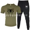 2025 Novo Conjunto Casual Esportivo Masculino de Duas Peças: Camiseta de Manga Curta e Calça, Verão, Gola Redonda, Cor Lisa, Estampado