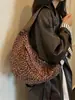 Bolso vintage de nicho con estampado de leopardo para otoño e invierno para mujer 2025 nuevo casual versátil marrón moderno para el trabajo bandolera tipo albóndiga