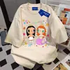 Camiseta de Algodão Puro com Estampa Divertida de Desenho de Menina, Manga Curta, Estilo Ins, para Mulheres, Verão 2026, Marca de Moda Americana, Tops Casuais para Casal