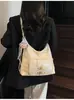 Bolsa Transversal de Axila Feminina 2025 Nova Moda Mochila Multiuso para o Dia a Dia Bolsa Tote de Axila Popular na Primavera