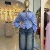 Ropa de mujer transfronteriza europea y americana 2026 otoño nuevo diseño elegante y juvenil camisa de manga larga a rayas con cuello camisero