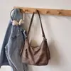 Colección de otoño 2026 transfronteriza: bolso de hombro elegante y de alta calidad, bolso tote retro, moderno y visualmente atractivo, gran capacidad, mochila casual