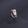 Nuevo Anillo de Acero de Titanio Oro Rosa Texto Romano Moda para Mujer Hueco Simple Atmosférico Anillo de Pareja Venta al por Mayor