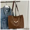 Bolsas Femininas de Nicho de Alto Padrão 2025 Nova Tendência Moda Texturizada Bolsa de Ombro Fofa Versátil Bolsa Tote de Grande Capacidade