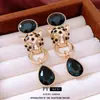 Brincos Pendentes Torcidos com Cabeça de Tigre Inlaid de Diamante Agulha de Prata Brincos de Tarraxa Moda Vintage com Senso de Design Brincos de Nicho