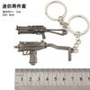 Arma devoradora de pollos periférica mini MK14awm 98K Glock sks rueda izquierda m416 juguete llavero traje
