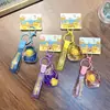 Llavero de Mochila Auténtico Pato Amarillo Botella de Aceite con Arena Movediza Colgante para Mochila Escolar Llavero de Coche Pequeño Regalo Venta al por Mayor