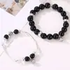 Pulseira Magnética Preta Brilhante Estilo Coreano Criativo Gravidade para Homens e Mulheres, Par de Pulseiras de Cristal Mutuamente Atraentes, Joia de Casal