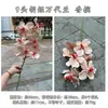 Fabricante de Flores de Fin de Año Orquídea Phalaenopsis de 9 Cabezas Cubo de la Fortuna Cubo de Abrazo Decoración para Bodas y Hogar Flores Artificiales al por Mayor