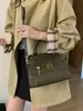 Bolsa Satchel de Camurça Retrô para o Dia a Dia de Mulheres 2025 Nova Tendência Moda Bolsa Kelly de Alto Padrão Grande Capacidade Bolsa Platina