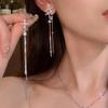 Lujo Ligero, Gama Alta, Pedrería Súper Brillante, Aretes de Borla Asimétricos de Estrella de Cuatro Puntas para Mujer, Nuevos Aretes de Moda