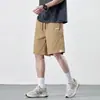 Pantalones cortos de algodón puro para hombre, nuevo estilo de verano 2026, pantalones casuales holgados de longitud media, pantalones de 5 puntos color caqui de alta gama