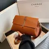 Bolso cruzado para mujer 2026 nuevo versátil para el trabajo bolsa cuadrada pequeña estilo coreano moderno diseño simple bolso de hombro bolso cruzado para mujer