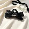Presilha de garra de luxo leve coreana com toque de alta qualidade, presilha tubarão com strass grande, presilha de cabelo da moda com laço e franja atacado