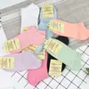 Calcetines de mujer calcetines tipo barco calcetines para estudiantes calcetines de moda para mujer color liso tobilleros calcetines invisibles suministro de puesto calcetines al por mayor