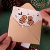 Nueva tarjeta de felicitación navideña de dibujos animados, regalo de Navidad hecho a mano con un sobre creativo para tarjeta pequeña.