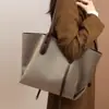 Bolsa de Mano 2026 Estilo Nuevo Lona para Mujer Sensación de Alta Gama Gran Capacidad Bolso de Hombro para Viajero Bolso Grande Equipaje