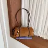 Nova bolsa de ombro feminina em camurça 2026, design transfronteiriço moderno e estiloso, bolsa tote de grande capacidade estilo francês
