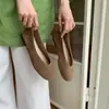 Zapatos planos de mujer estilo retro con punta redonda y boca poco profunda, nueva colección otoño 2026, mocasines casuales versátiles de gamuza sin cordones