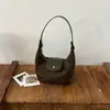 2026 Nuevo Bolso Casual Retro de Hombro para Viajes Diarios Bolso Tipo Dumpling de Gran Capacidad Bolso Cruzado Versátil de Moda