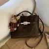 Bolsa Pequena Retro Transfronteiriça para Mulheres 2026 Nova Coleção de Primavera Versátil Bolsa de Mão para o Dia a Dia Bolsa Saco Bolsa de Ombro Transversal Texturizada