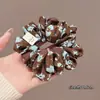 Estilo Otoño e Invierno Estampado de Leopardo de Gama Alta Pequeño Floral Cuerda para el Cabello Elegante Cola de Caballo Cuerda para el Cabello Estilo Coreano Versátil Anillo Pequeño de Intestino Banda Elástica