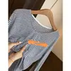 Camiseta a rayas de manga larga, hombros descubiertos, corte holgado, relajada y adelgazante, estilo coreano, para mujer, nueva para principios de otoño
