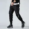 Pantalones cruzados nuevos para hombre, estilo coreano, modernos, corte holgado, estilo ins para estudiantes, pantalones cargo chic casual cortos, marca de moda, con puños en los tobillos
