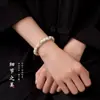 Pulseira de Contas Flor de Lótus Flutuante em Balde de Jade Branco Pequeno Original Ecológico de Hainan para Mulheres Enrolar no Dedo Disco de Bodhi Macio Brincando com Contas de Buda
