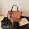 Otoño 2026 Nuevo Diseño Vintage Moda Femenina Versátil Bolso Cruzado Pequeño Cuadrado de Mano Bolsos de Mujer al por Mayor