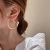 Pendientes de aguja de plata con forma de cruz redonda exagerada de Europa y Estados Unidos, nuevos pendientes de temperamento retro, ligeros, de lujo, con sentido del diseño, para mujer, al por mayor
