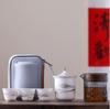 Juego de té de viaje para uso en exteriores: Tetera de Vidrio Portátil con Tres Tazas de Cerámica