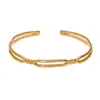 Pulsera trenzada de acero inoxidable simple Tohm de venta caliente transfronteriza para mujer, pulsera abierta de lujo ligero retro de alta gama al por mayor