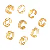 Anillo de dedo con diseño de costura hueca geométrica de nicho retro británico, anillo de apertura de acero de titanio chapado en oro, joyería en capas