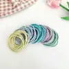 100 piezas en un cubo de anillos básicos para extensiones de cabello sin costura, ligas para el cabello roscadas antideslizantes para coletas altas, ligas para el cabello que no dañan el cabello