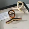Grampo de Tubarão Geométrico Oval de Liga de Metal Estilo Coreano Verão 2025 Grampo de Cabelo Feminino Acessório de Cabelo Fresco Doce