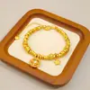 Loja de Ouro Mesmo Estilo Areia Dourada Bússola Estrela Pulseira Trançada Novo Estilo Chinês Roda Estelar Pulseira Cobre Banhado a Ouro Nicho Joia de Mão