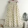 Saia Versátil de Bolinhas de Cintura Alta Patchwork Linha A Estilo Novo Esconde a Barriga Super Estilosa com Bolsos Moda e Versátil 2026