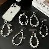 Correa creativa para teléfono con cuentas en forma de corazón, cadena para funda de teléfono DIY, colgante de corazón con cuentas hecho a mano, accesorio decorativo