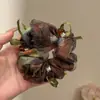 Temperamento Outono Inverno 2026 Novo Prendedor de Cabelo Estilo de Cabelo Atmosfera Francesa Prendedor de Cabelo Xadrez Alta Elasticidade Anel de Cabelo de Intestino Grosso Acessórios de Cabelo