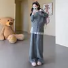 Novo conjunto de outono/inverno para maternidade: Cardigã de gola redonda estilo coreano combinado com uma saia de renda e calças compridas - um conjunto de duas peças que cobre a barriga, oferece suporte e cria um efeito emagrecedor