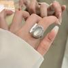Nuevo anillo de calcedonia blanca de estilo chino con forma de huevo para mujer, diseño de nicho, ligero y lujoso, anillo ajustable para dedo.