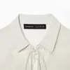 Moda casual europea y americana para mujer 2026 con tapeta irregular, bordado de encaje y color liso, modelo E490773
