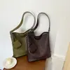 Bolsa de Grande Capacidade Feminina 2026 Nova Moda Outono Bolsa Transversal Tecida Toque de Luxo Super Quente Bolsa de Ombro Único Tipo Saco