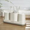Armazenamento de Banheiro porta-escova de dentes de mesa suprimentos domésticos criativos copo de lavagem de plástico conjunto porta-escova de dentes sem furos